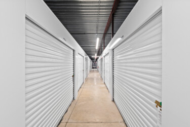 aisle of temperature-controlled storage units at Brownsville Storage Units in Brownsville, TX
